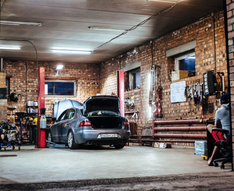 wide angle of an auto repair shop with brick walls